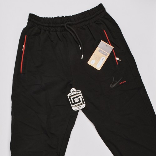 خامة قطن بجامة jordan باللون الاسود  فصال ممتاز خصر وقدم لاستيك خطوط باللون الاحمر 