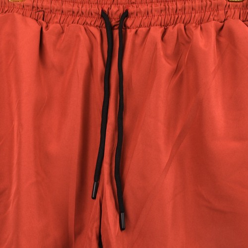 شورت رياضي مدمج بستريج قصير يغطي نصف الساق فصال اكثر من رائع  nike للجنسين برتقالي واسود