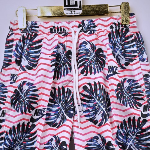 خامة شورت صيفية باردة nike  بطانة شبكية مريحة لون مشجر