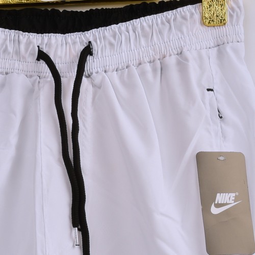 خامة مريحة باردة شورت NIKE جيوب زنجيل مع خصر وجيوب متباينة اللون